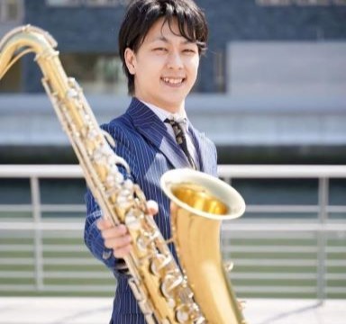 呉本哲也